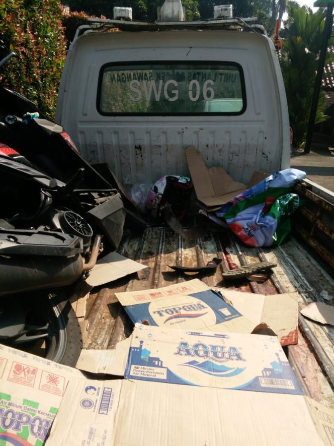 
					Bikers Tewas Terlindas Bus Pariwisata di Raya Muchtar