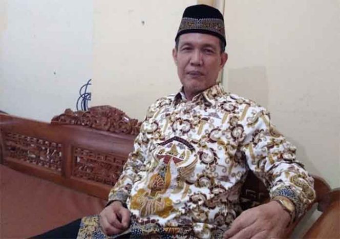 
					Iskandar Salech, kepala SMPN 18 Depok 