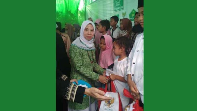 
					Suasana santunan yatim dan Dhuafa di Tapos. 
