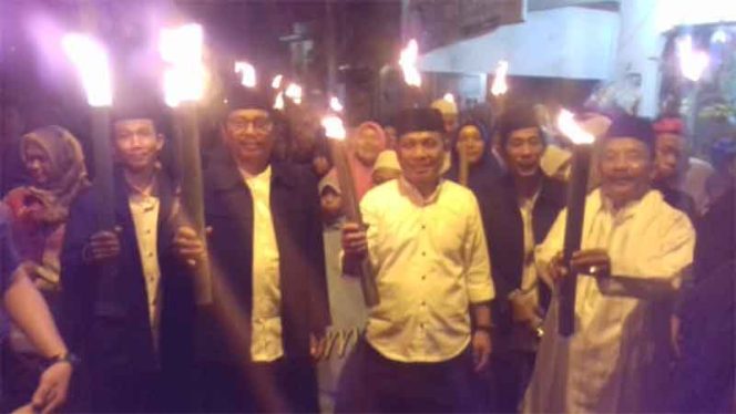 
					Pawai obor sambut Tahun Baru Islam di Pondokcina.