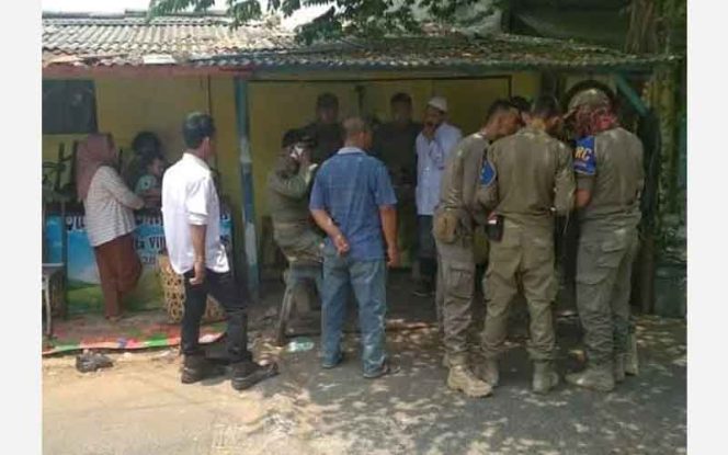 
					Bangunan liar yang berdiri di sekitaran Situ Rawa Besar di Kecamatan Pancoran Mas, Kota Depok..