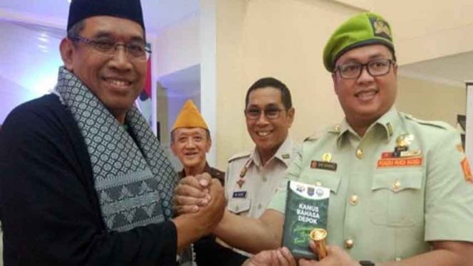 
					Ketua KOOD, Dahlan salam komando bersama Ketua PPM, Hendry Gunawan.