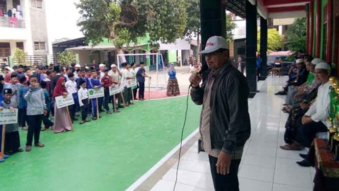 
					Kepala Dinas Sosial, Usman Haliyana memberikan sambutan dalam pembukaan Porseni Panti Asuhan. 