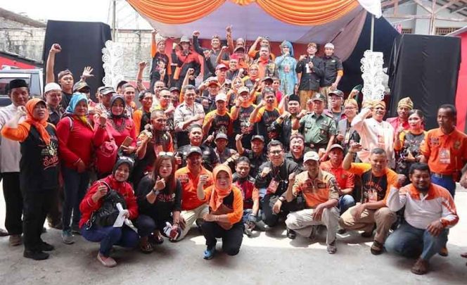 
					relawan komunitas Sarana Komunikasi Timur (SAKTI)