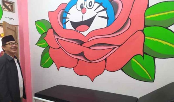 
					Kampung Mampangan di Kelurahan Kemirimuka yang dilukis hingga tampak indah.  