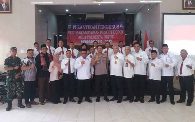 
					Pelantikan pengurus Pokdarkamtibmas di Aula Atmani Adhi Wedhana Mapolrestro Depok.