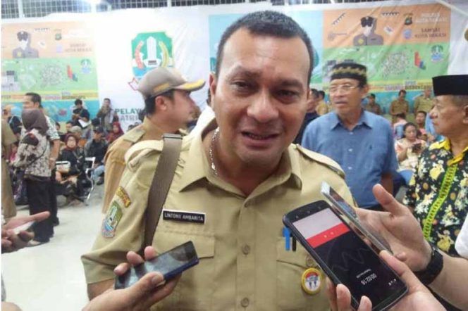 
					Kepala Dinas DPMPTSP, Lintong Ambarita