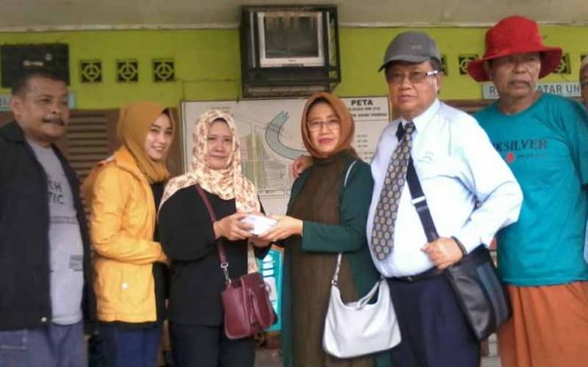 
					Yayasan Teratai Putih Global Bantu Korban Banjir