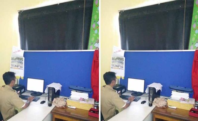 
					Salah satu staf Kelurahan Bojongsari Baru sedang aktifitas di ruang kerja. Tampak jendela kantor ditutupi terpal.