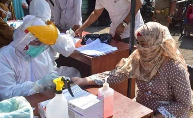 
					Rapid Tes Massal di Pasar Baru